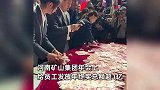 “河南最爱发钱老板”又来了！6000万现金铺满160米长桌，数对多少拿多少