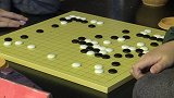 棋牌-16年-中小学围棋多人赛在京举办 国手名家指点 卧虎藏龙人才辈出-新闻