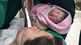 这新生儿，鼻头有肉耳垂大，声音洪亮中气足，天生的福相！