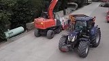 为什么重型拖拉机在泥泞道路上行驶运输比卡车好用？