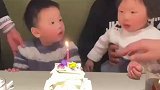 萌娃过生日吹蜡烛屡吹不灭