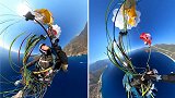 法国女子玩滑翔伞时被绳子缠住 连人带伞在高空翻转画面惊险
