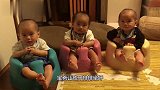 3胞胎排排坐看视频，不料一个哭泣，剩下的也要跟着