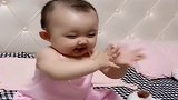 养了9个月的小祖宗，一听到音乐就是这幅样子，好想亲她一口