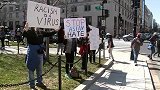 美国亚裔人士在首都华盛顿举行集会 抗议针对亚裔暴力行为