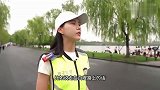 免费为游客定格微笑，杭州西湖边有一位“掌管拍照”的义警小姐姐