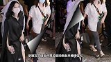 吴宣仪凌晨下班睡眼惺忪，穿黑色长袍，神秘优雅