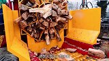 德国发明劈柴机，油缸一吹轻松搞定，劈柴过程如同砍瓜切菜