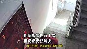 男子遭女邻居砸门咒骂近一年-一天能砸4次门，报警四五十次仍无果