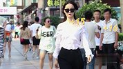 美女走在街头一小时 会吸引多少男人的目光？