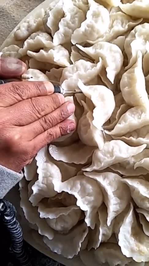 雕刻的艺术,简单的一块石头,被他雕刻成饺子