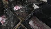4.22亿伪造人民币案缴获现场：仅假币纸就达6吨