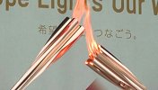 奥运火炬传递在东京进行 一切从简 仍有民众反对奥运会的举办