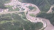 航拍四川阿坝水电站漫坝 四川水利厅：全溃可能性不大