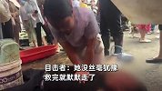 男子心脏骤停倒地，女药剂师跪污水里施救，目击者：她没丝毫犹豫