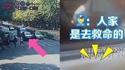 无视救护车多次鸣笛,路口轿车一动不动 车主：我在等红灯……