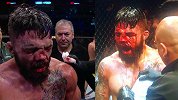 UFC选手飞膝打断对手鼻梁 2分钟血流不止染红八角笼