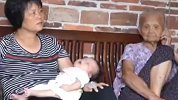 丈夫猝死妻子抱3岁女儿跳楼 留下刚出生50天的儿子