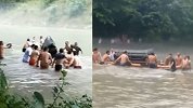 湖北咸丰一老人出殡正逢河道涨水 村民扶棺泅度送遗体过河