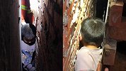 哭笑不得！7岁男童被卡30厘米墙缝2小时：放学回家想抄近路