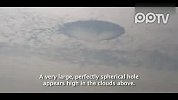 实拍台南奇观：天空破洞.罕见圆形云闭吸睛
