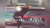 疑夫妻吵架，男子直接将老婆孩子拖出车外，孩子在车流中嚎啕大哭