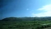 旅游-车窗外草原风景