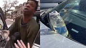 纽约黑人男子闯红灯被警察拦停询问 开车门就泼不明液体投燃烧瓶