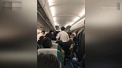 万米高空乘客突发疾病 2名医生徒手清口中异物救命