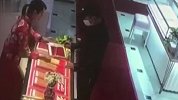 没钱又不想工作！男子抢劫金店被2名女店员按倒