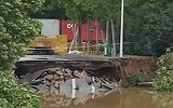暴雨后  郑州一路面塌陷1600平米