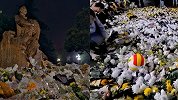 破防了！西南大学袁隆平院士雕像被鲜花环绕 花海上还有一颗排球