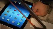 New iPad3遭锯子活剐直冒烟