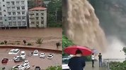 重庆暴雨引发多重灾害：山洪形成瀑布砸击公路 河水倒灌停车场