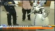 日本推出新款看家型机器人 手机远程控制