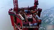 中国首创“造楼机”：4天盖起1层楼 100米的楼200天盖起