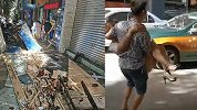 四川南充闹市三家店铺招牌突然掉落砸伤行人 现场一片狼藉