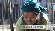 部落戴鼻塞的妇女