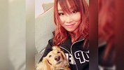 格斗-18年-日本摔跤女王抱狗卖萌 笑容甜美似新垣结衣-新闻