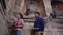 珊珊看着石窟里的佛像，心中无限感慨