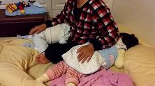 超强奶爸一番苦练开发出左右开弓哄萌娃睡法，一口气哄宝宝不费劲