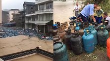 浙江乐清遭台风“利奇马”袭击 数百煤气罐漂浮水面：皆为空瓶