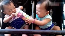 一个空饮料杯引发的双胞胎争夺战，互不相让的样子好可爱