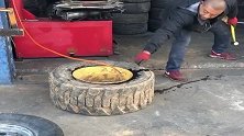 民间高手补胎，轮胎上点把火，两锤子就搞定了！