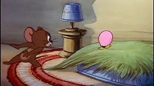 猫和老鼠：杰瑞清早起来，发现自己屁股下出现了一个蛋，结果蒙了