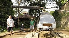 堵车的时候我想飞！印尼一男子在自家后院自制直升机