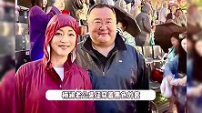 杨澜与58岁老公合体看奥运，举国旗拍照浑身湿透，为中国队加油