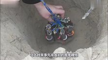 将10个鞭炮绑扎在一起，放入两米的大洞之中点燃，真是壮观啊