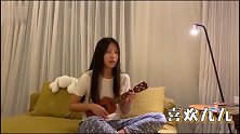 胡军女儿自弹自唱为武汉加油，长发披肩温文尔雅
