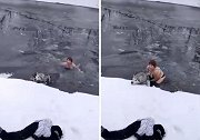 俄罗斯一65岁女子跳入冰河中救出被困哈士奇